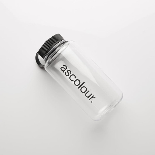 A drink bottle in clear plastic with a black screw-on lid and a logo on the side.