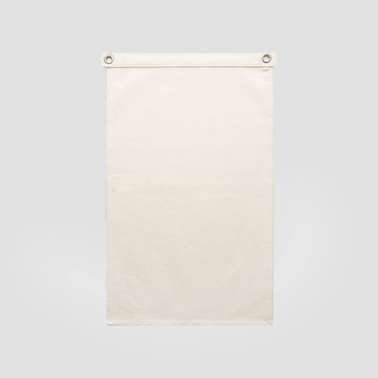 A cream-coloured canvas flag with metal eyelets for hanging. Features a plain design without any text or images.