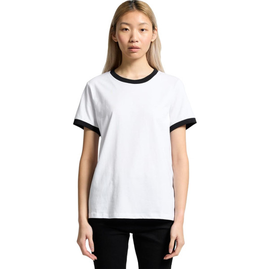 A white t-shirt with black ringer accents and a logo on the chest. The model stands against a plain background.