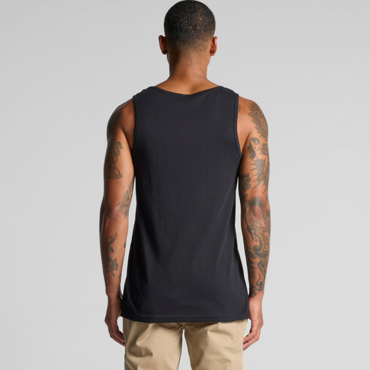 A black singlet worn by a person, featuring a plain design and showing tattooed arms. The back view is visible.