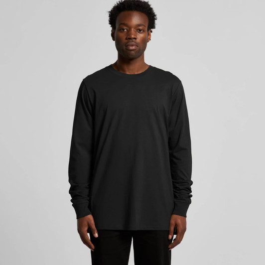 A long-sleeve black T-shirt displayed on a model, featuring a simple design and a logo.