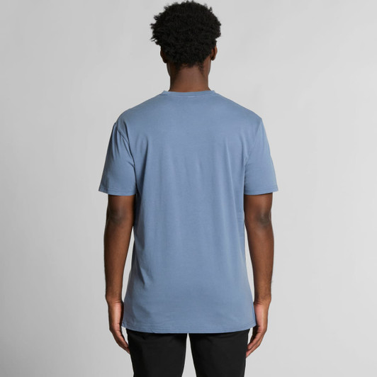 A plain faded blue t-shirt viewed from the back, featuring short sleeves and a relaxed fit.
