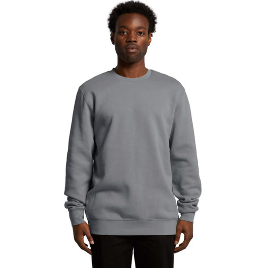 A grey hoodie is displayed on a male model, featuring a classic crew neck and long sleeves, with a logo present.