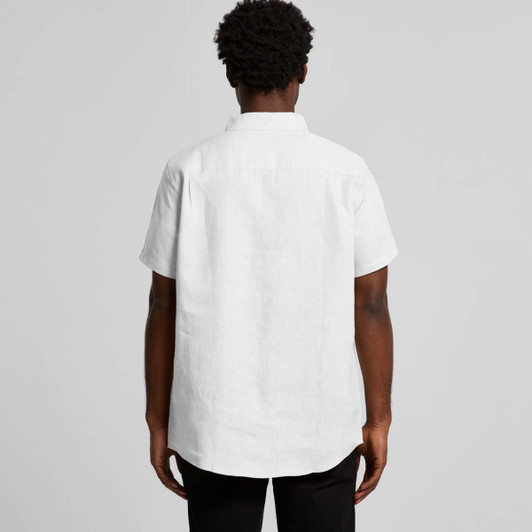 A white linen short-sleeve shirt displayed from the back, featuring a collar and a logo.