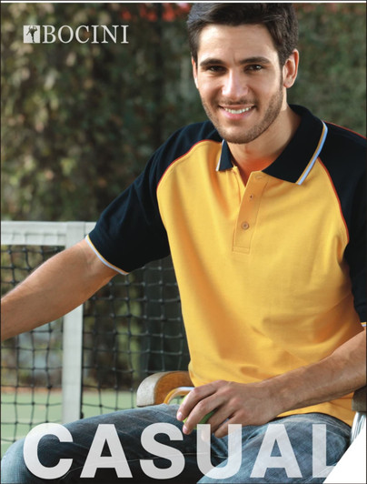 A unisex three-tone polo shirt in yellow, navy, and red, featuring a logo, worn by a man sitting outdoors.