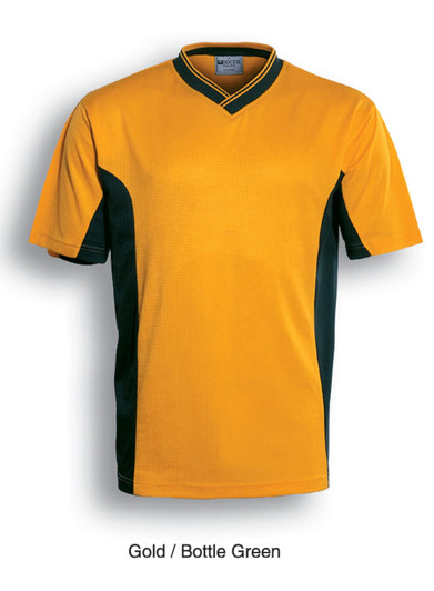 A kids' soccer jersey in gold and bottle green with short sleeves and a v-neck design. It features a logo.