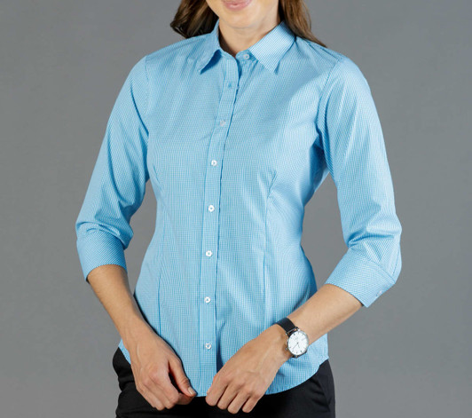 A blue gingham button-up shirt with a fitted design and three-quarter sleeves, featuring a logo on the chest.