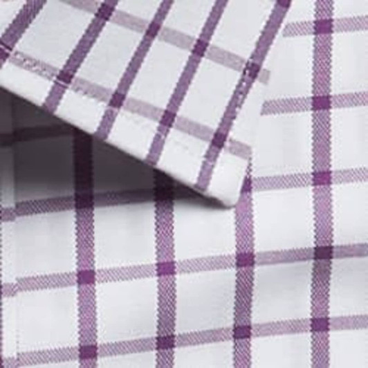 A button-up shirt featuring a white fabric with a purple check pattern and a folded collar.