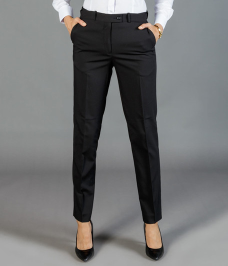 A pair of slim leg slacks in black, featuring a tailored fit and pockets. The model wears black high heels.