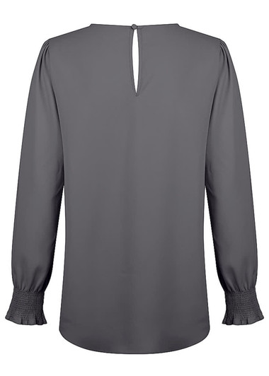 A grey long-sleeve blouse with shirred cuffs and a keyhole back detail, featuring a logo on the label.