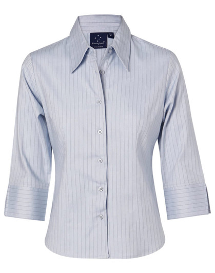 A light blue, long sleeve, button-up shirt with vertical stripes and a logo on the collar.