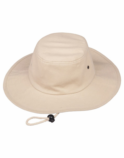 A beige bucket hat with a chin strap and a branded logo, featuring a wide brim for sun protection.