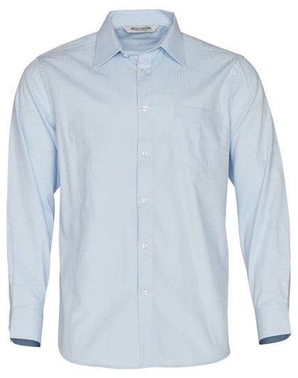 A light blue long sleeve button-up shirt with a herringbone pattern and a chest pocket. Features a logo on the label.