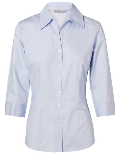 A light blue women's button-up shirt with 3/4 sleeves and a collar. Features a solid colour and has a logo.