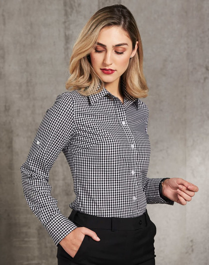 A black and white gingham check roll-up long sleeve shirt with a button-up design, featuring a logo on the garment.