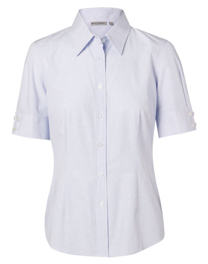 A light blue, short-sleeved women's button-up shirt with a collar and button details on the sleeves, featuring a logo.