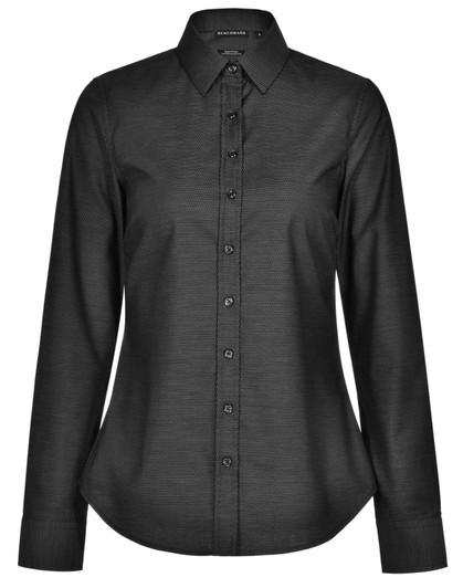 A black pin dot stretch long sleeve shirt with a button-up front and a collar. It features a logo on the label.