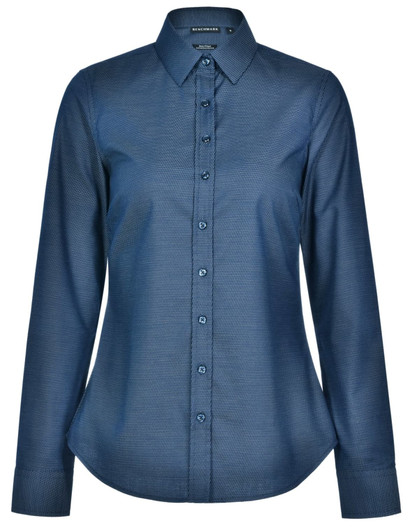 A long-sleeved, button-up shirt in dark blue with a pin dot pattern and a collar. It features a logo on the label.