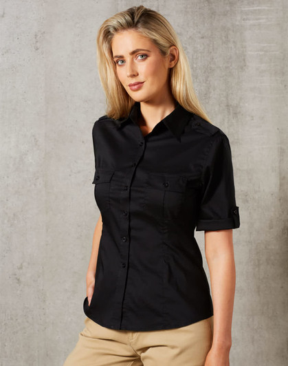A short sleeve military shirt in black, featuring a button-up design and two front pockets.