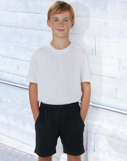 Kids' bamboo charcoal sports shorts in black, styled with a plain white t-shirt, featuring pockets.