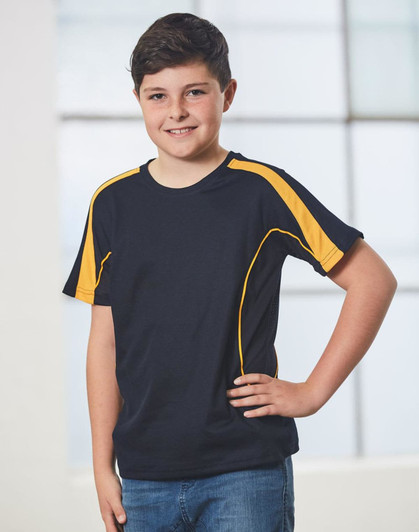 A black and yellow short-sleeved T-shirt featuring a logo, modelled by a smiling boy in front of a bright window.