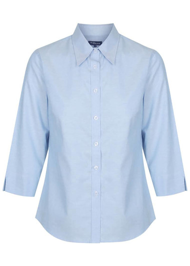A light blue button-up shirt with long sleeves and a collar. Features a logo on the side.