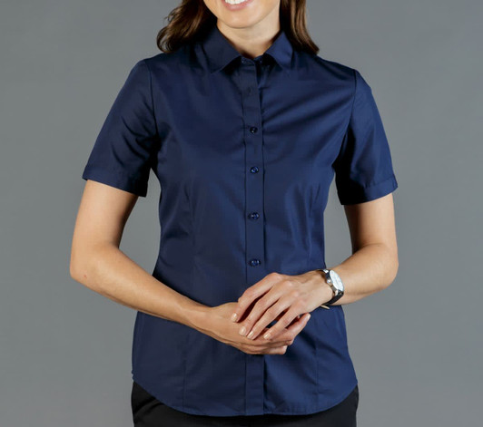 A navy blue button-up shirt with short sleeves and a collar, featuring a branded logo.