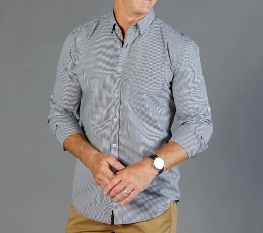 Button-up shirt in a black and white gingham pattern. Features long sleeves and a standard collar. Includes a logo.