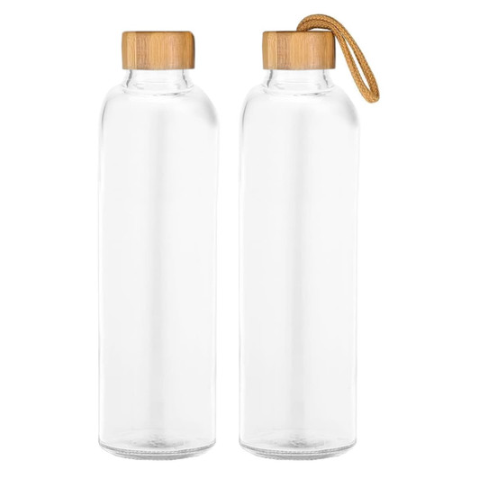 A drink bottle featuring a clear glass body and a bamboo lid, some with a leather strap.