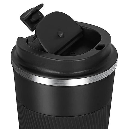A travel mug in black with a silver band and a spill-proof lid design. It features a textured grip.