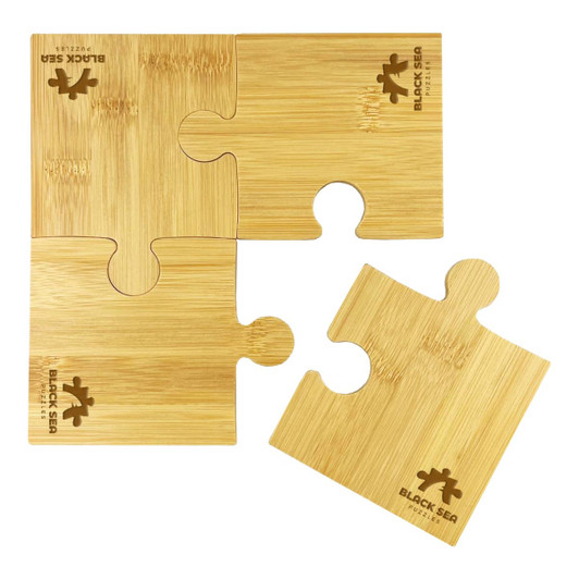 A bamboo coaster set featuring four puzzle-shaped pieces, coloured in natural bamboo tones, with a logo design.
