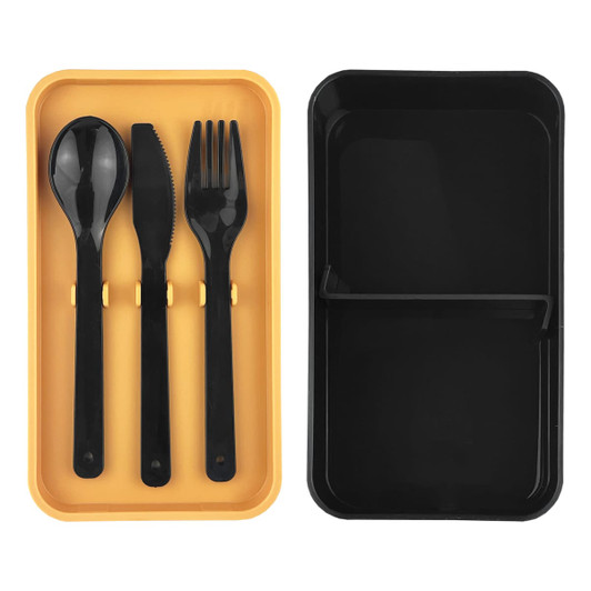 A black and yellow bamboo lunch box with compartments and black cutlery: spoon, fork, and knife.