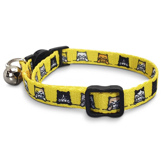 A yellow cat collar featuring illustrated cat patterns and a black buckle, complete with a small bell.