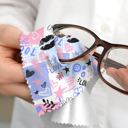 A colourful RPET microfibre cleaning cloth held between fingers, designed for cleaning glasses and screens.