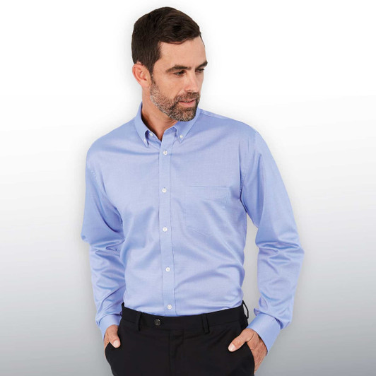 A blue button-up shirt with a collar and long sleeves, featuring a pocket and a logo.