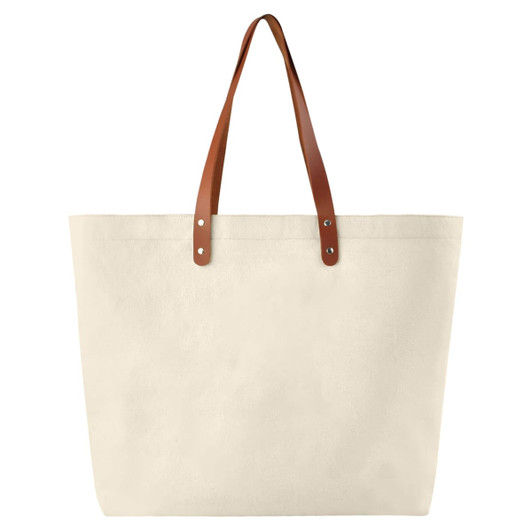 A beige cotton tote bag with brown leather handles and metal studs, featuring a simple design.