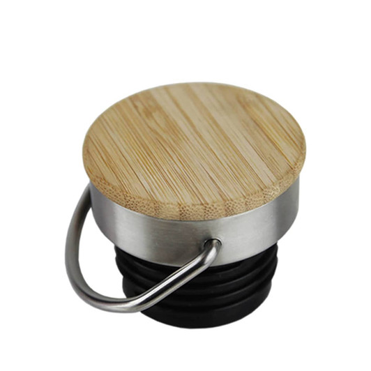 A drink bottle lid with a bamboo top and a silver metal ring, featuring a black rubber base.