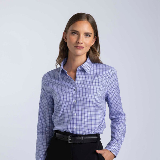 A women's blue check button-up shirt featuring a collared design and long sleeves, with a logo on the chest.