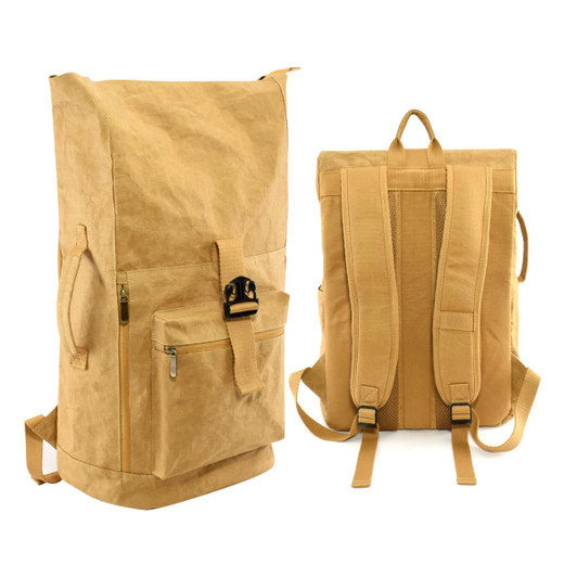 A tan laptop backpack made of kraft paper, featuring a front pocket and padded straps. It has a logo on one side.