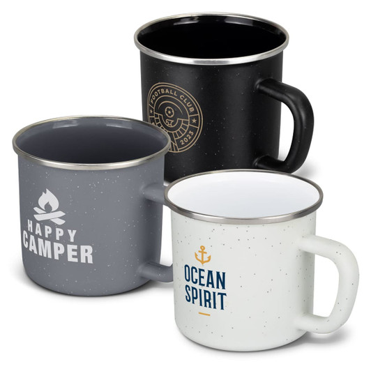 A set of three matte enamel mugs in black, grey, and white, each with distinct logos and designs.