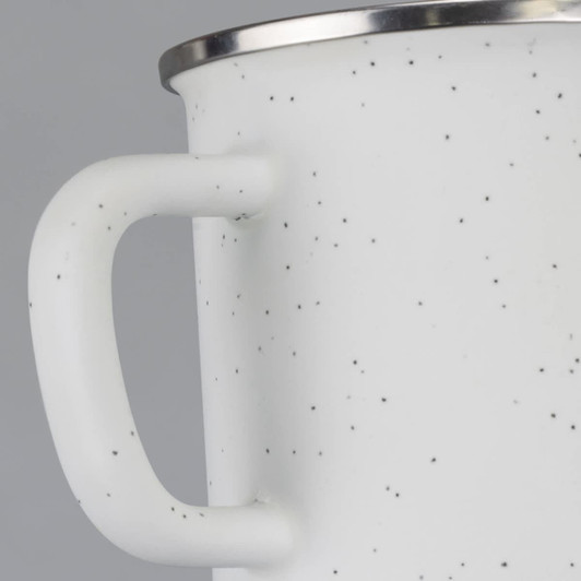 A matte enamel mug in white with black speckles and a stainless steel rim. It features a sturdy handle.