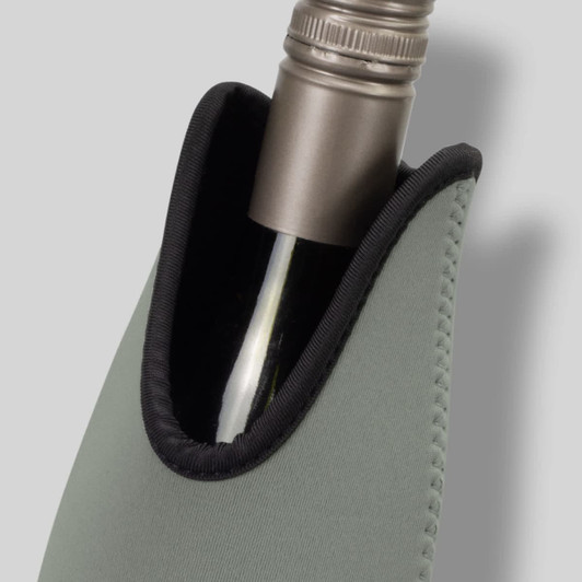 A drink bottle cooler in olive green, shaped to fit a wine bottle, with a smooth, stitched border and a metallic top.