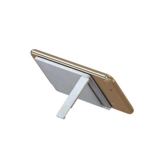 A mobile stand in grey, holding a smartphone at an angle. The stand features a simple, minimalist design.