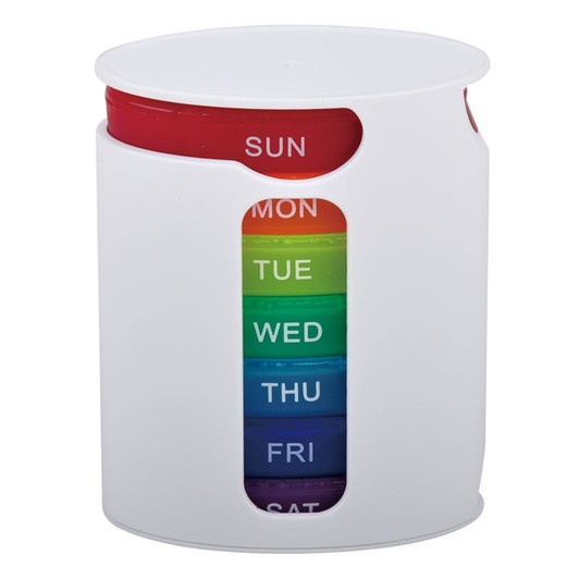 A white pill box with seven colourful compartments, labelled for each day of the week, featuring a circular design.