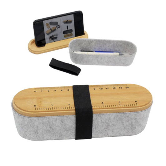 A grey felt box with a bamboo lid, featuring a ruler design and an elastic band, alongside a slim container and a phone stand.