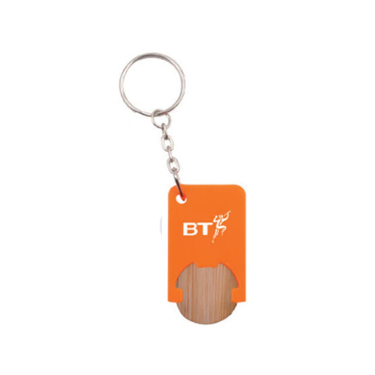An orange key tag with a wooden section, attached to a metal keyring, featuring a logo.