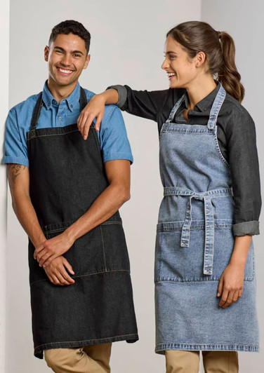 Two models wearing denim aprons, one in black and the other in light blue, against a plain background.