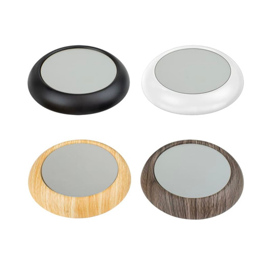 A set of four USB cup warmers in black, silver, light wood, and dark wood finishes, featuring a circular design and glass top.