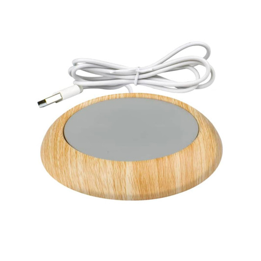 A wooden USB cup warmer with a smooth grey surface and a white power cord. It features a minimalist design.