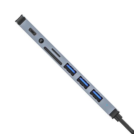 A grey USB hub featuring dual inputs, multiple Type-A ports, and a Type-C connection, with a sleek design.